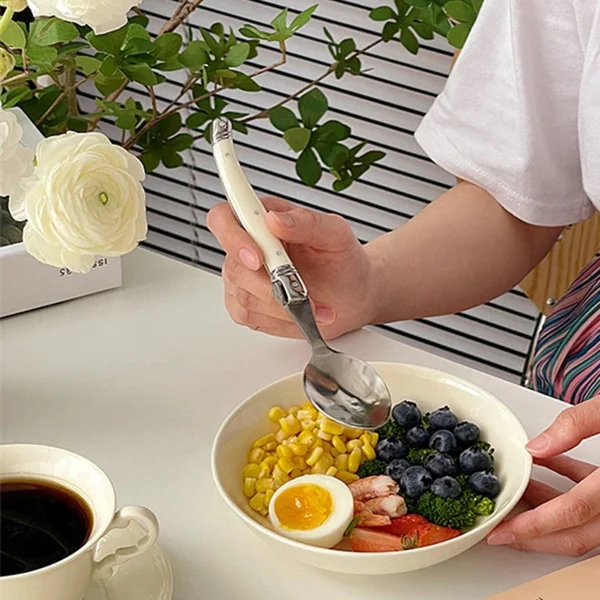 NordicGlow Cutlery Set – White Handle Elegance