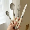NordicGlow Cutlery Set – White Handle Elegance
