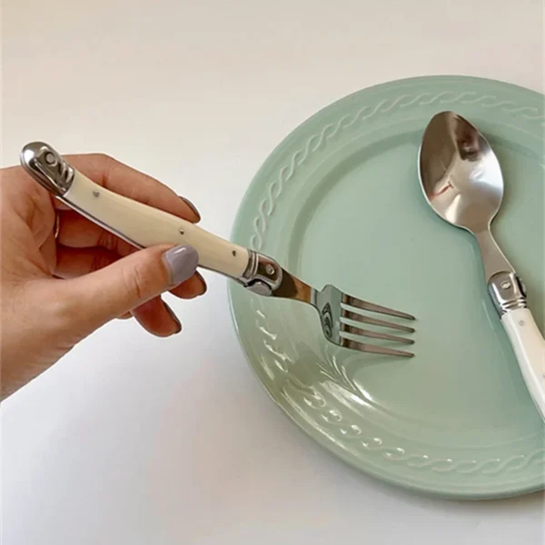 NordicGlow Cutlery Set – White Handle Elegance
